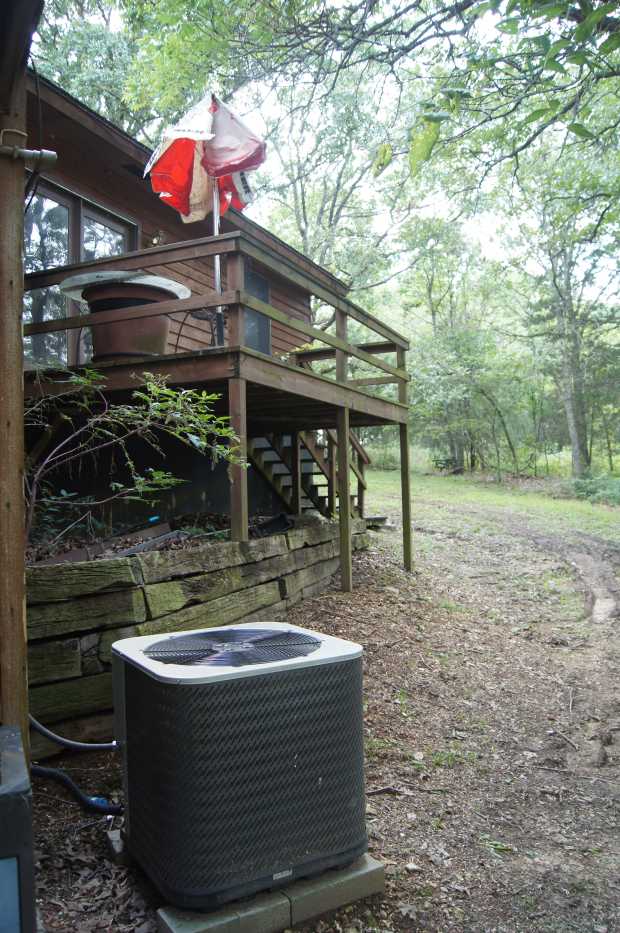 Air conditioning unit and small balcony at Caro Drive