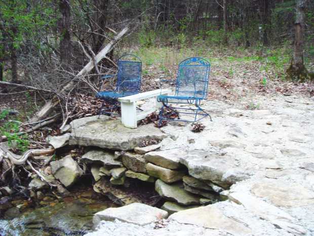 Chairs on small bridge at Caro Drive