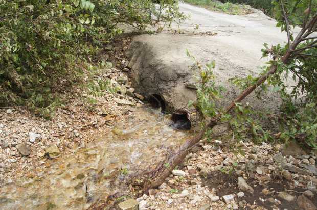 Culverts under driveway bridge at Caro Drive