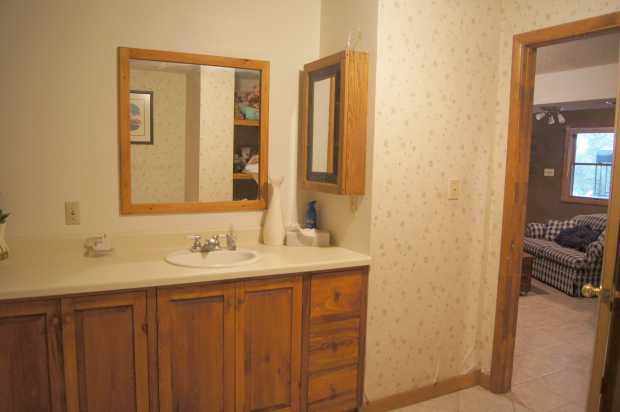 Bathroom looking out downstairs at Caro Drive