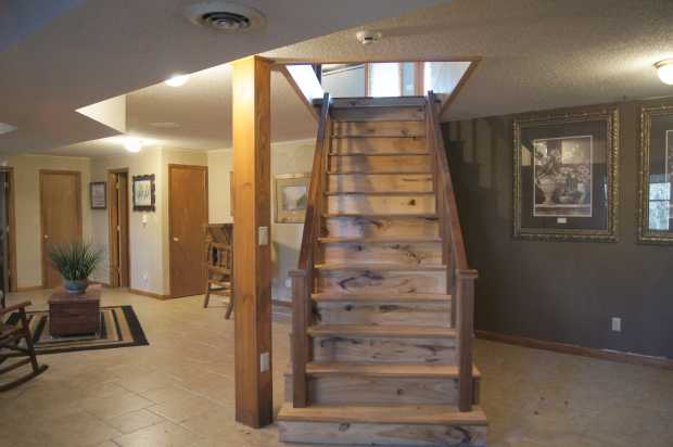 Both sides of staircase downstairs at Caro Drive