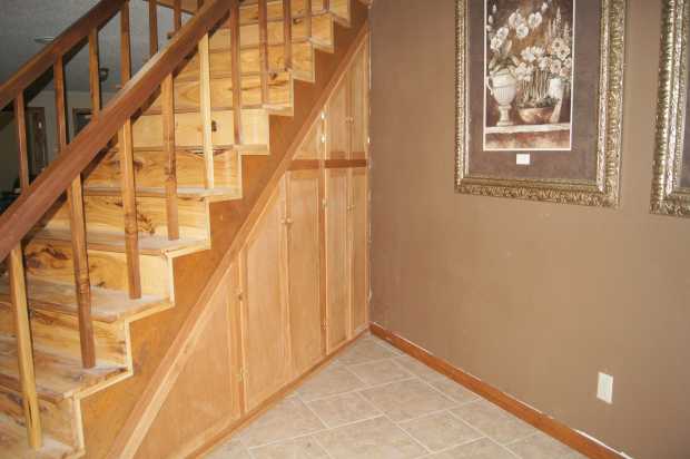 Staircase cabinets downstairs at Caro Drive