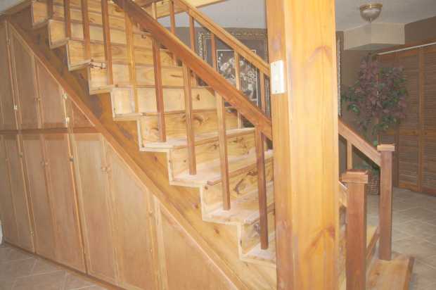 Staircase cabinets downstairs at Caro Drive